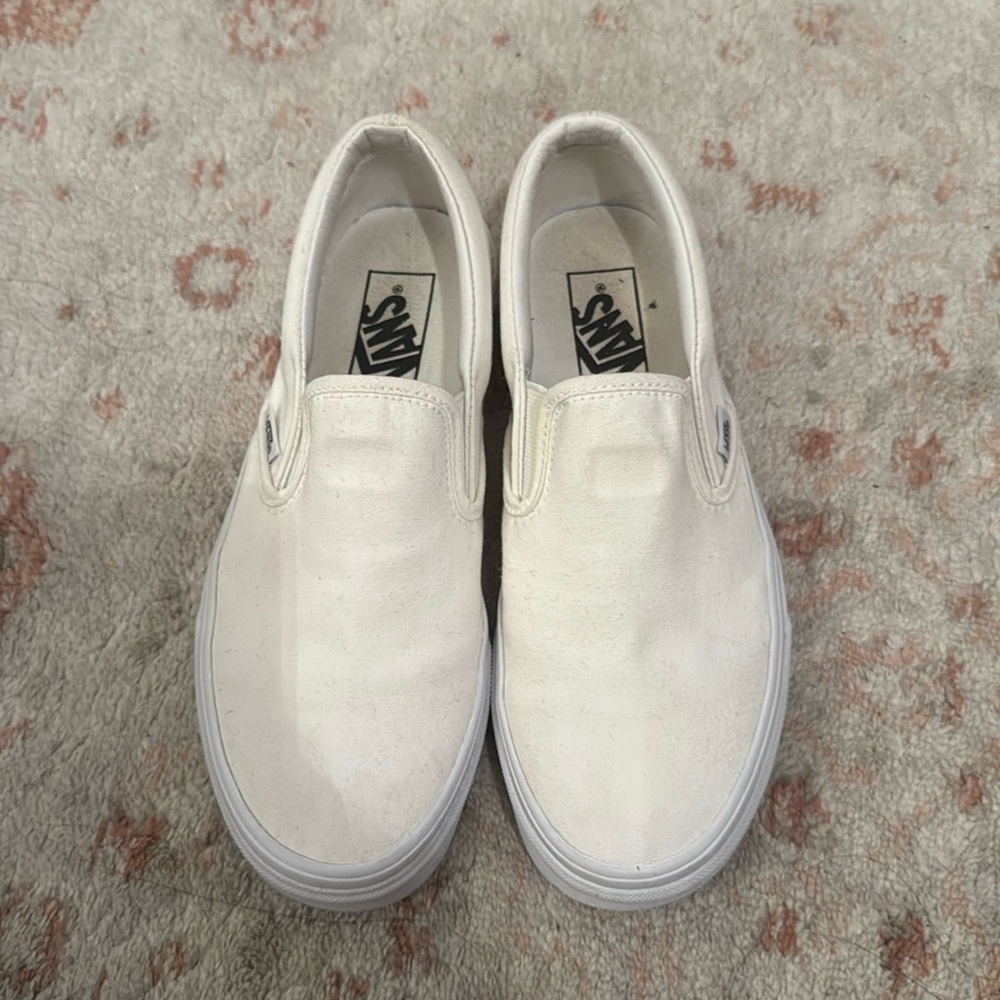 White slip on Vans